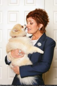 Sharon Osbourne holding her cute chihuahua